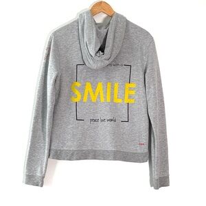 Peace Love World Women’s Happy Face Hoodie